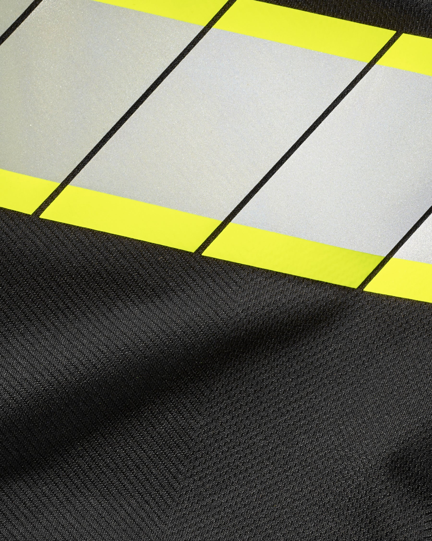 Reflective trim and contrast fabric detail on the STRAUSS Enhanced Visibility Polo Shirt in black
