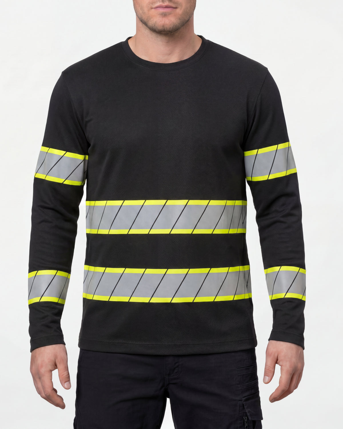 A model wears the STRAUSS Enhanced Visibility Long Sleeve Shirt in black with dark work pants and work boots in a studio product scene