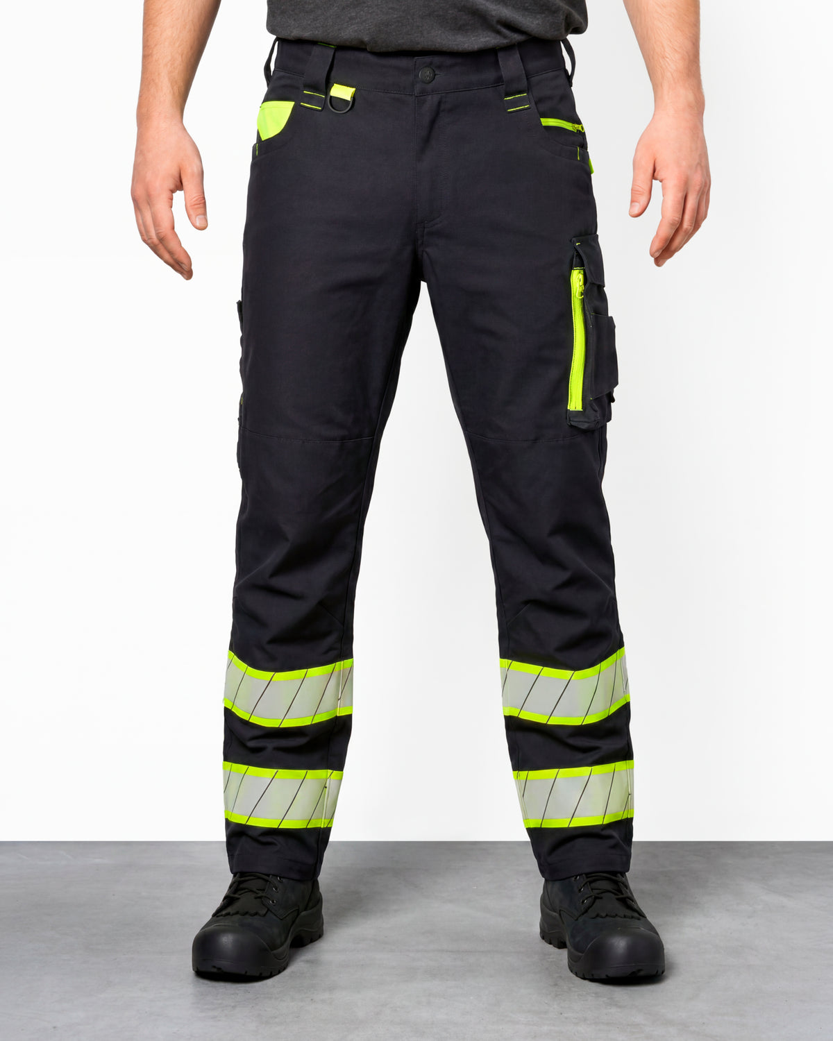 Enhanced Visibility Work Pants in black worn by a model, front view