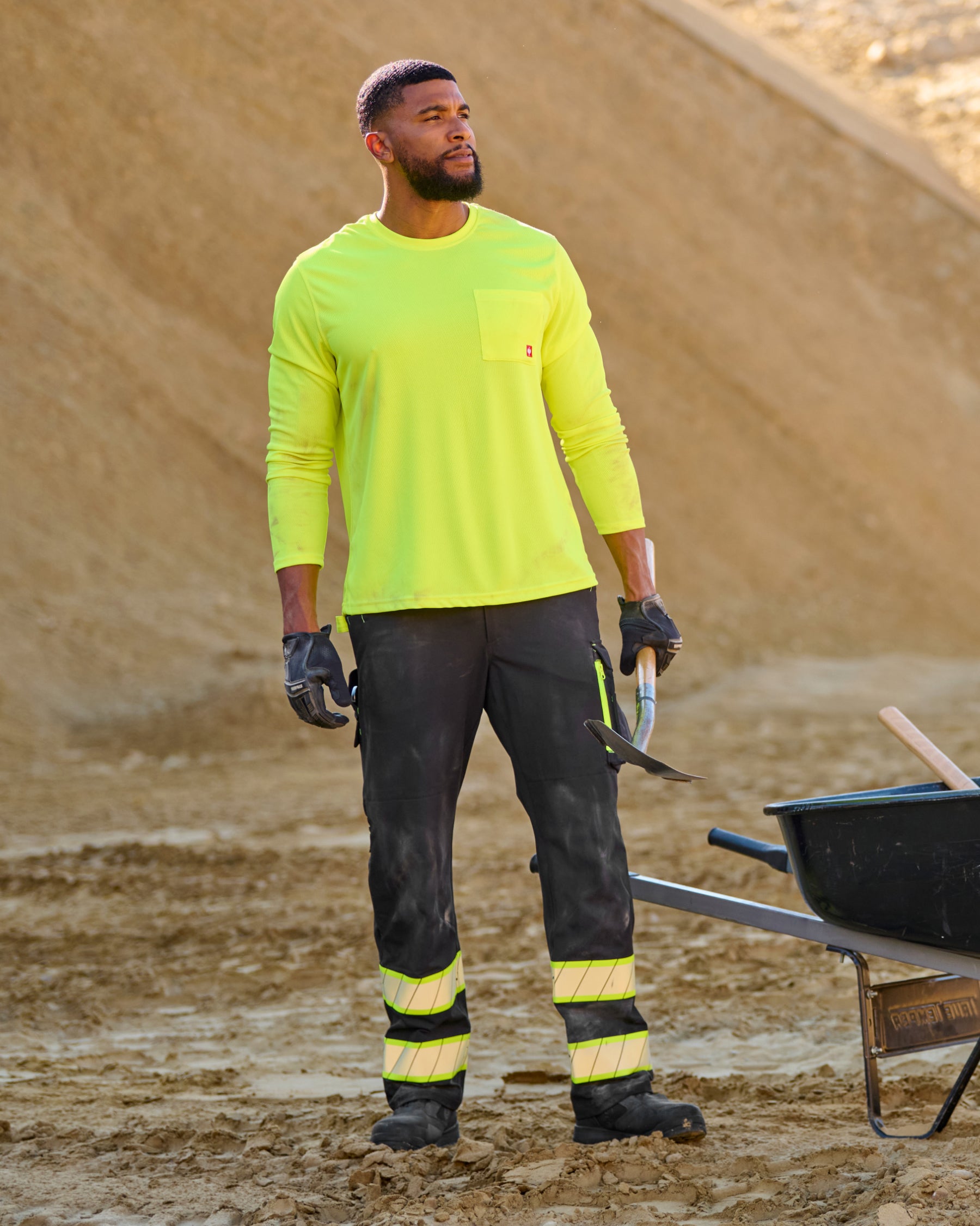Lifestyle view of Enhanced Visibility Work Pants in black during work