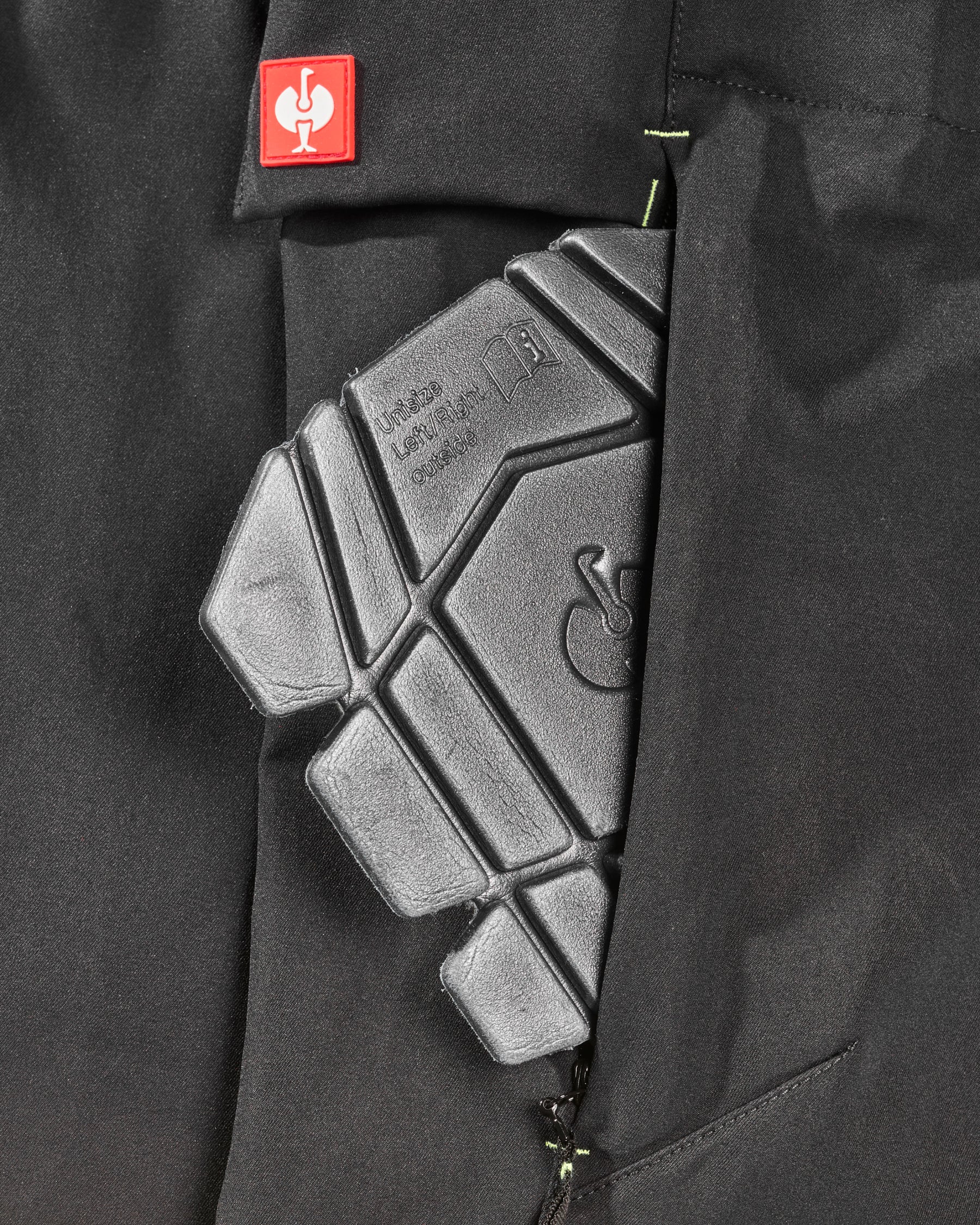 Close-up of knee pad pocket on Enhanced Visibility Work Pants in black