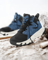 STRAUSS Rimini 6-inch Soft Toe Boot in Oxid blue and Cream worn in an outdoor work setting