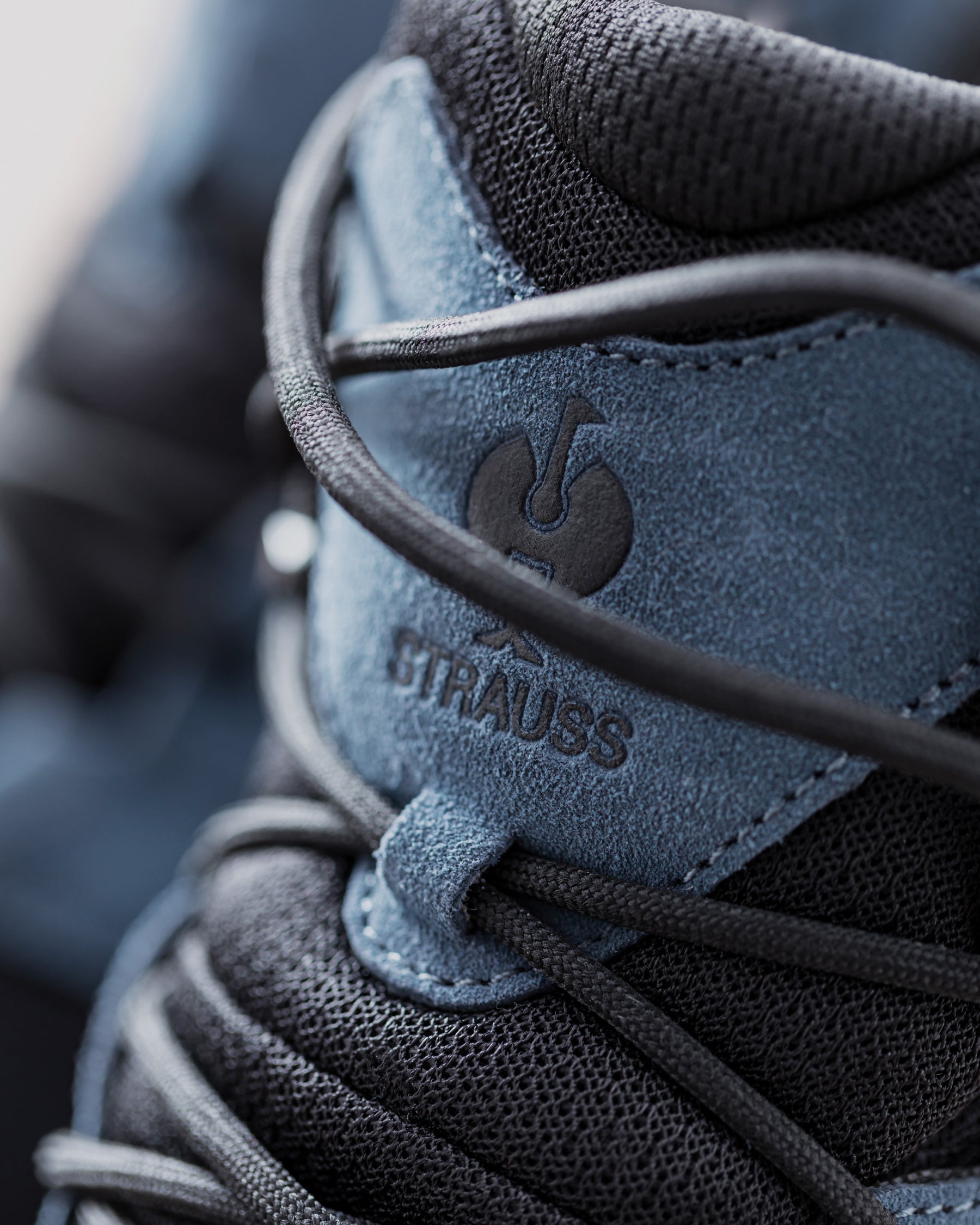 Close-up of the STRAUSS Rimini 6-inch Soft Toe Boot in Oxid blue upper and laces