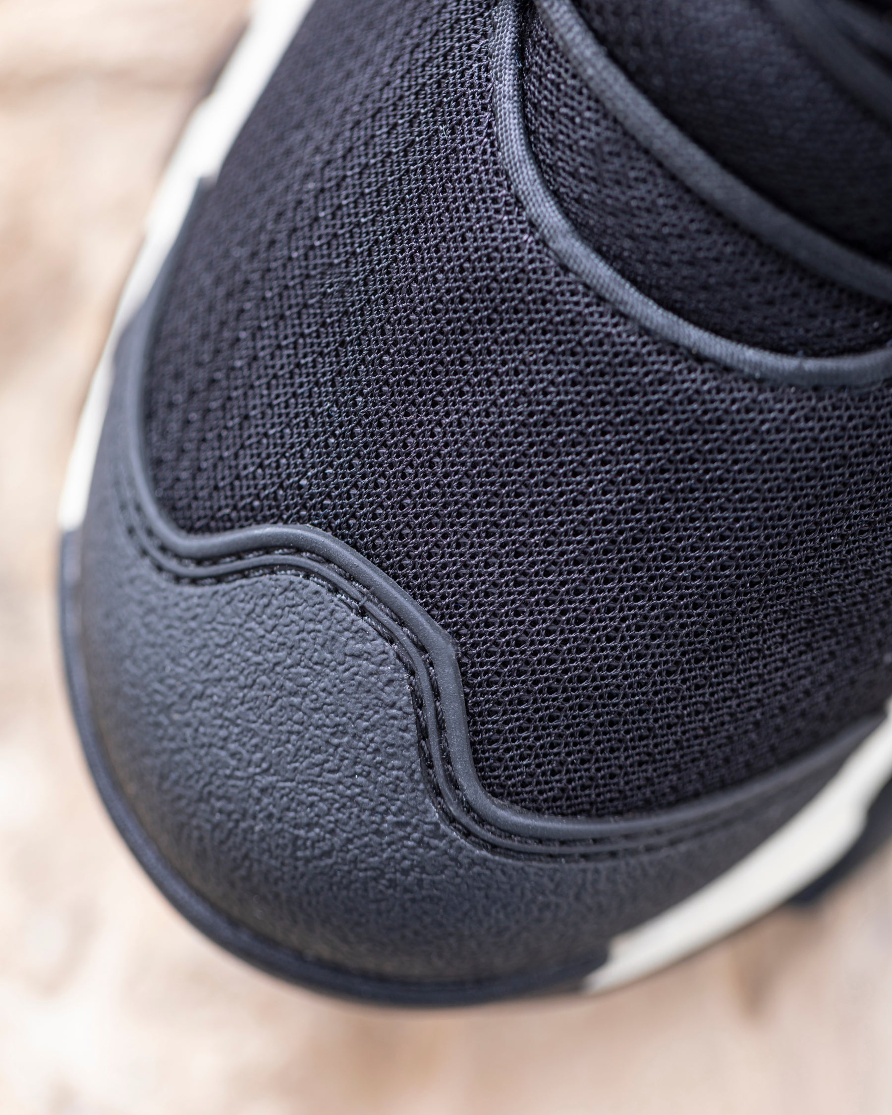 Close-up of the Oxid blue and Cream Rimini 6-inch Soft Toe Boot soft toe area