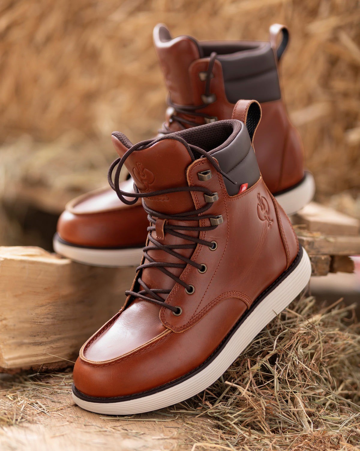 STRAUSS Boulder 6-inch Soft Toe Boot in Red brown with workwear in a jobsite scene