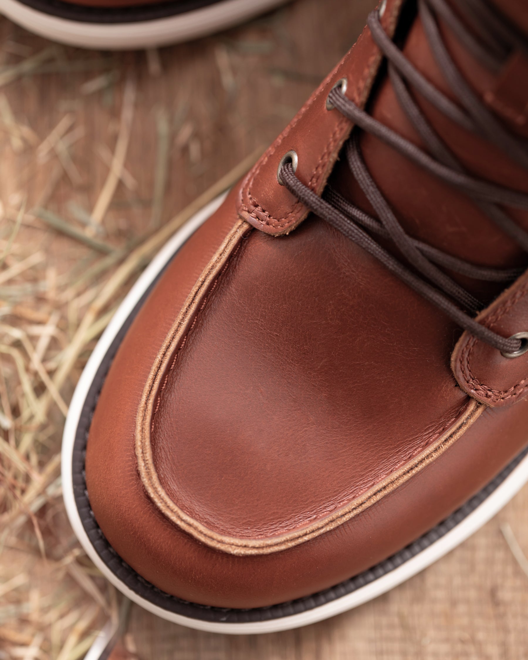 Close-up of the Red brown Boulder 6-inch Soft Toe Boot soft toe area