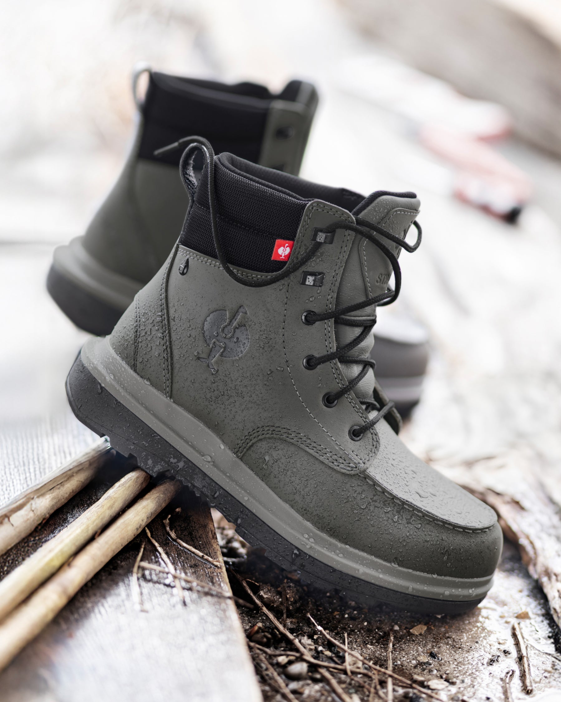 STRAUSS Ridgewood 6-inch Soft Toe Boot in Carbon gray with workwear in a jobsite scene