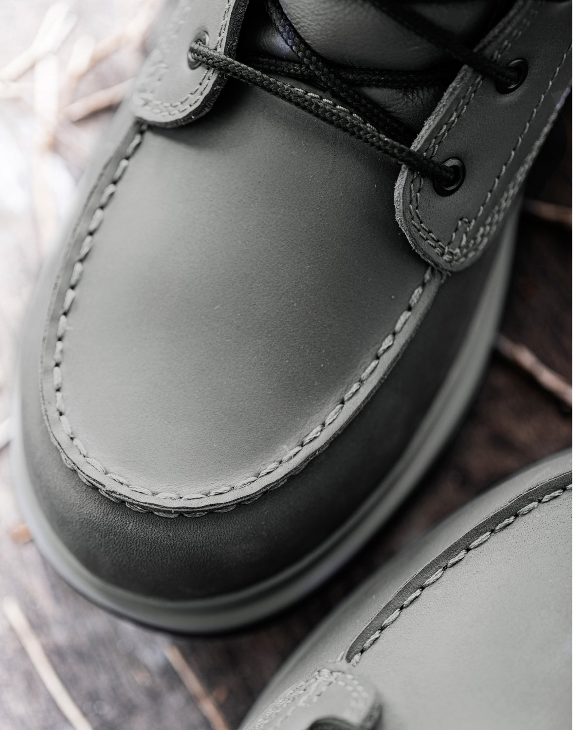 Close-up of the Carbon gray Ridgewood 6-inch Soft Toe Boot soft toe area