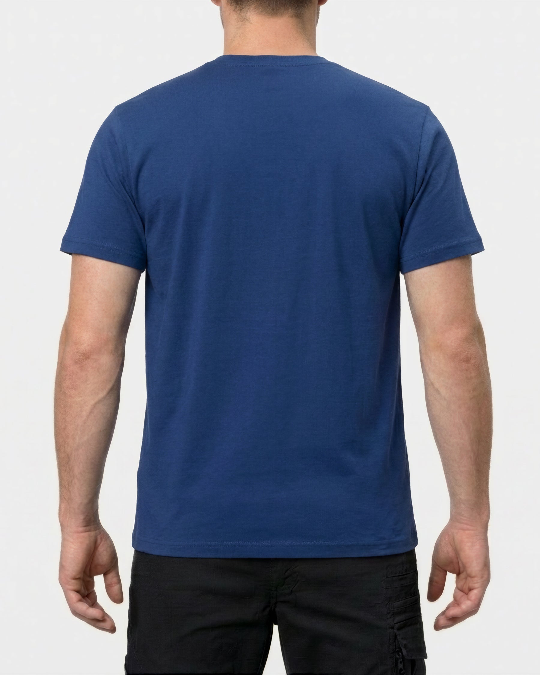 A model wears the STRAUSS Cotton Stretch T-Shirt in alkali blue with tan work pants and work boots, showing the shirt fit