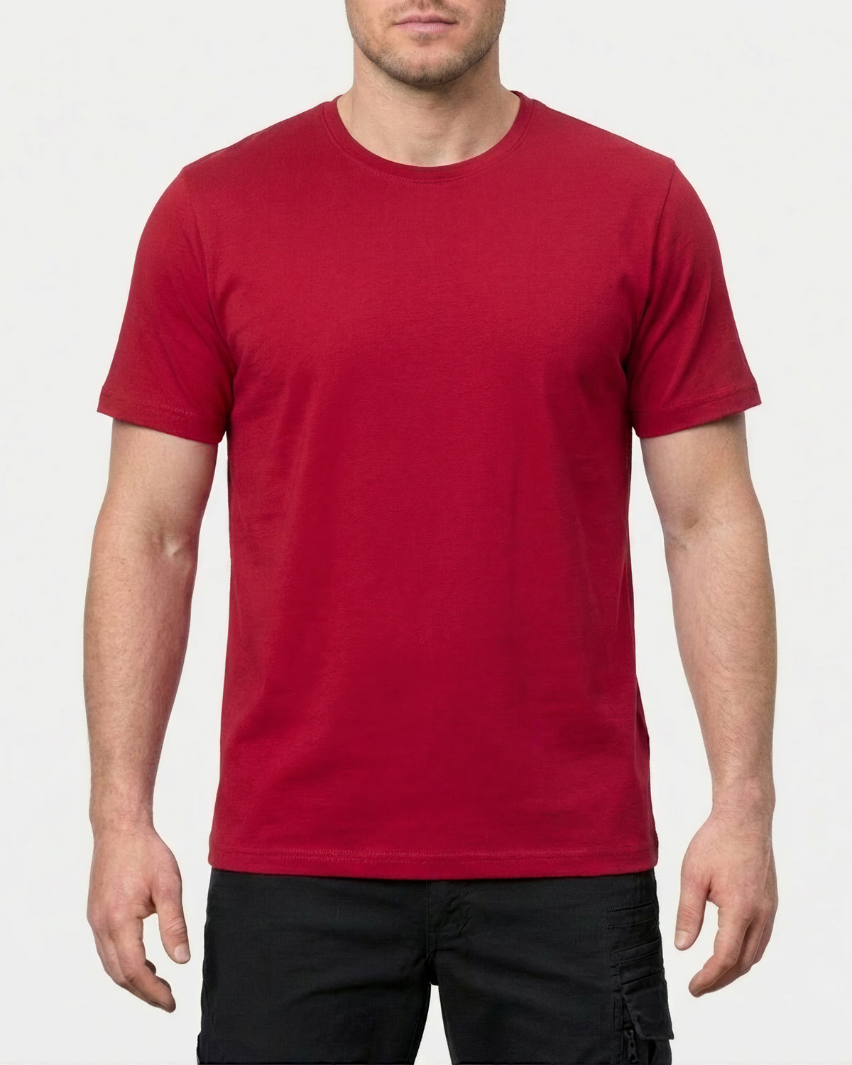 A model wears the STRAUSS Cotton Stretch T-Shirt in fire red in a studio product scene