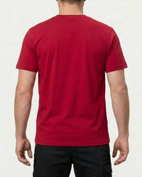 A model wears the STRAUSS Cotton Stretch T-Shirt in fire red, showing the shirt fit
