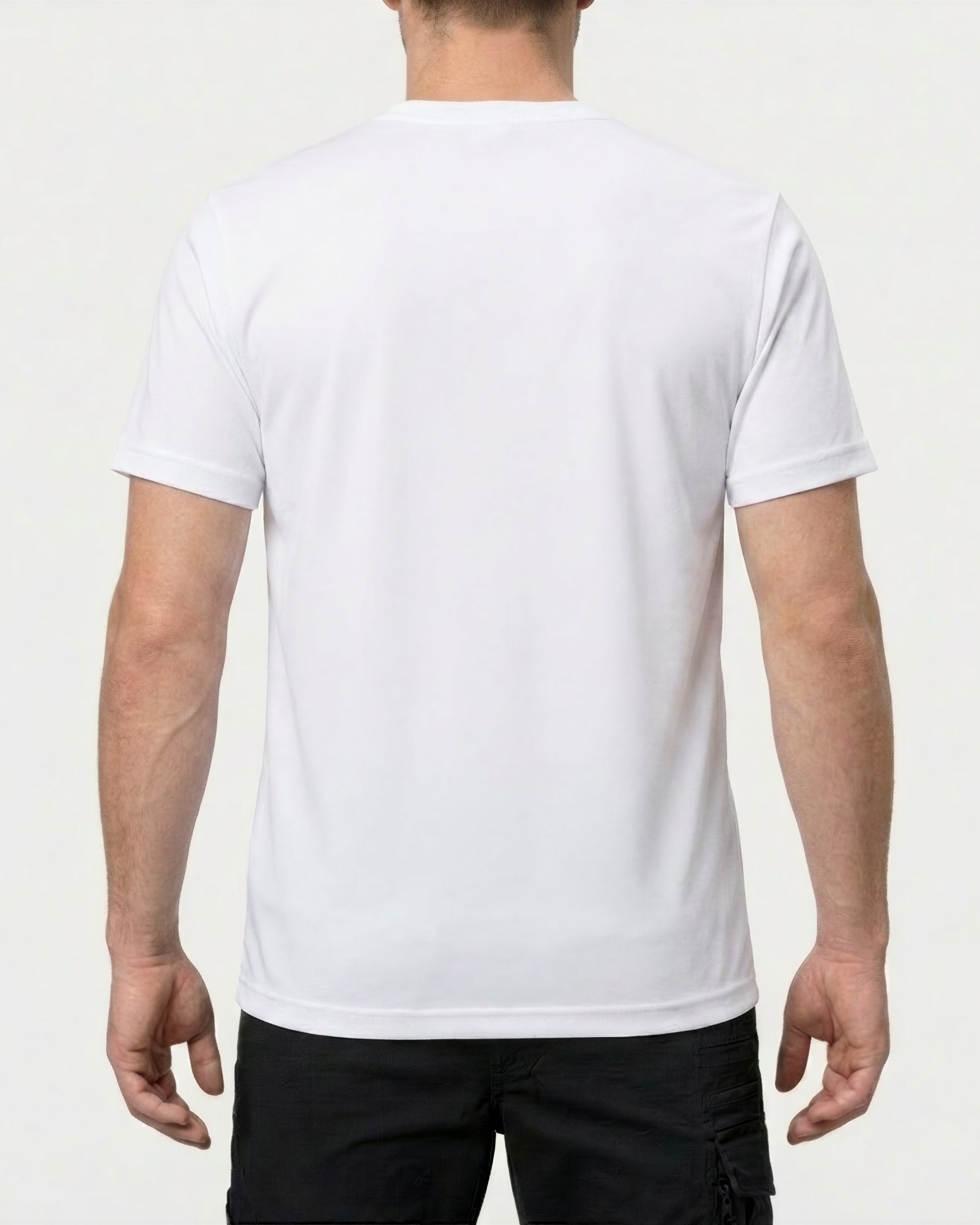 A model wears the STRAUSS Cotton Stretch T-Shirt in white with tan work pants and work boots, showing the shirt fit
