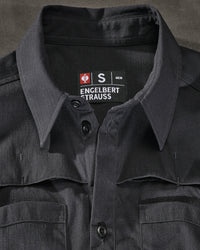 Chest pocket, snap placket, and stretch ripstop fabric on the STRAUSS e.s.taktik Stretch Ripstop Long Sleeve Work Shirt in black
