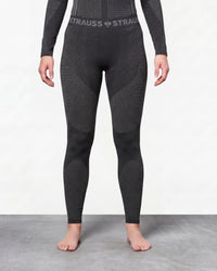 Women's Warm Seamless Thermal Pants e.s.trail pure in black/basalt gray worn by a model, front view