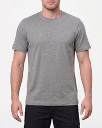 A model wears the STRAUSS Cotton T-Shirt in gray melange in a studio product scene