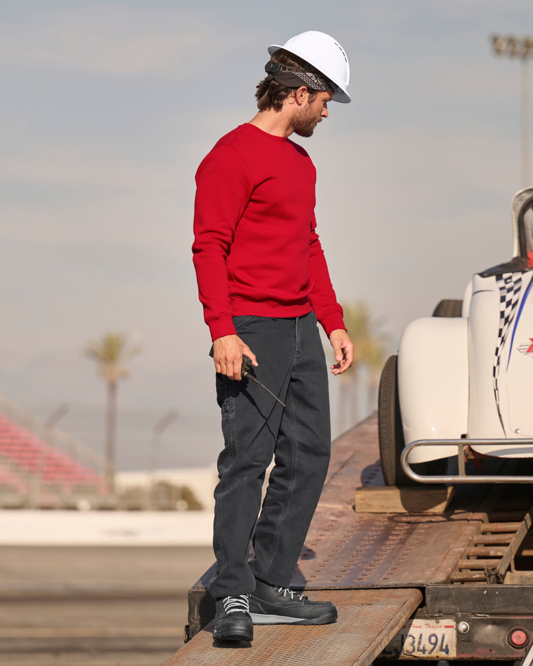 STRAUSS cotton-poly crew neck sweatshirt in fire red, worn in workwear outfit