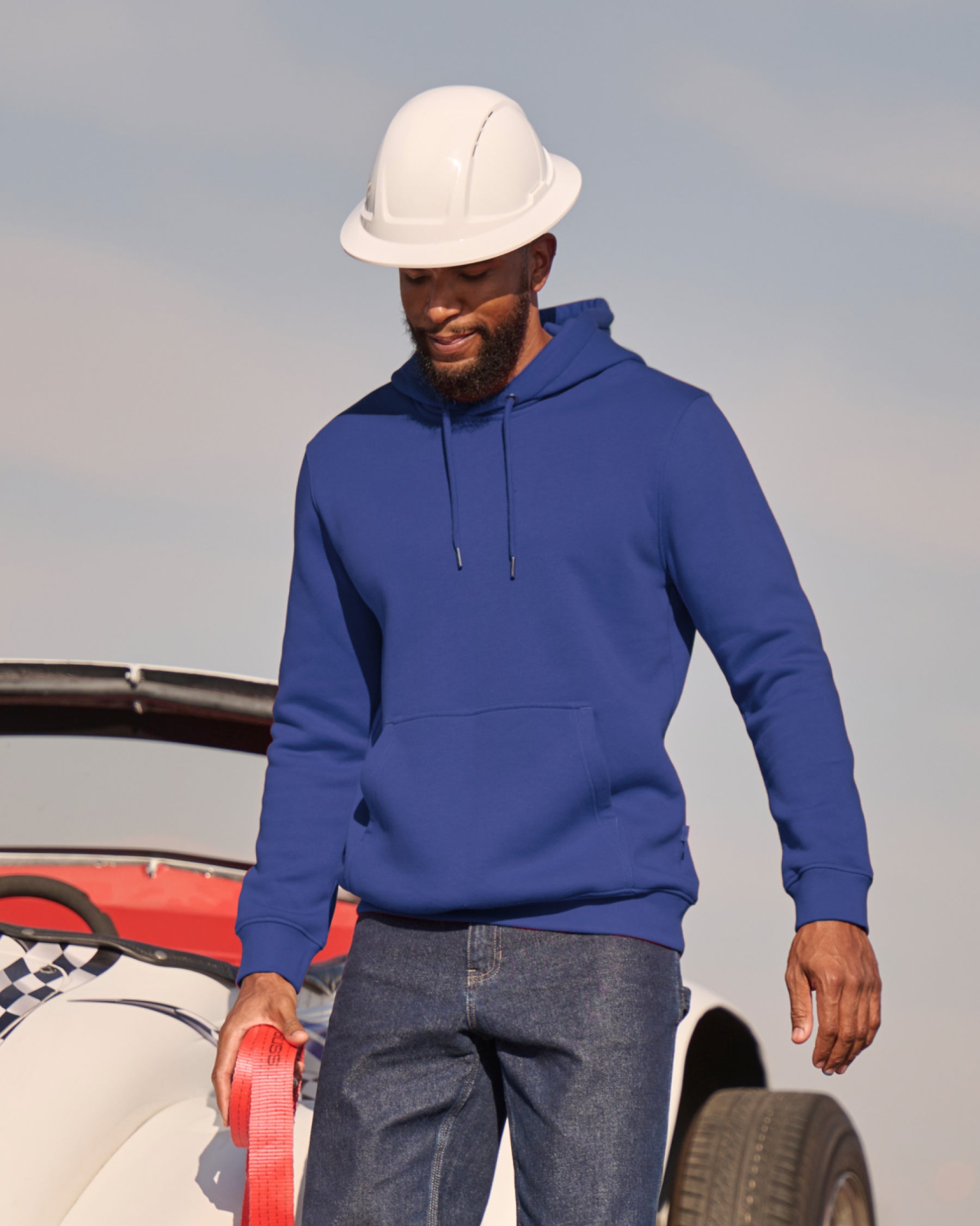 STRAUSS cotton-poly hoodie in royal blue, worn in lifestyle setting