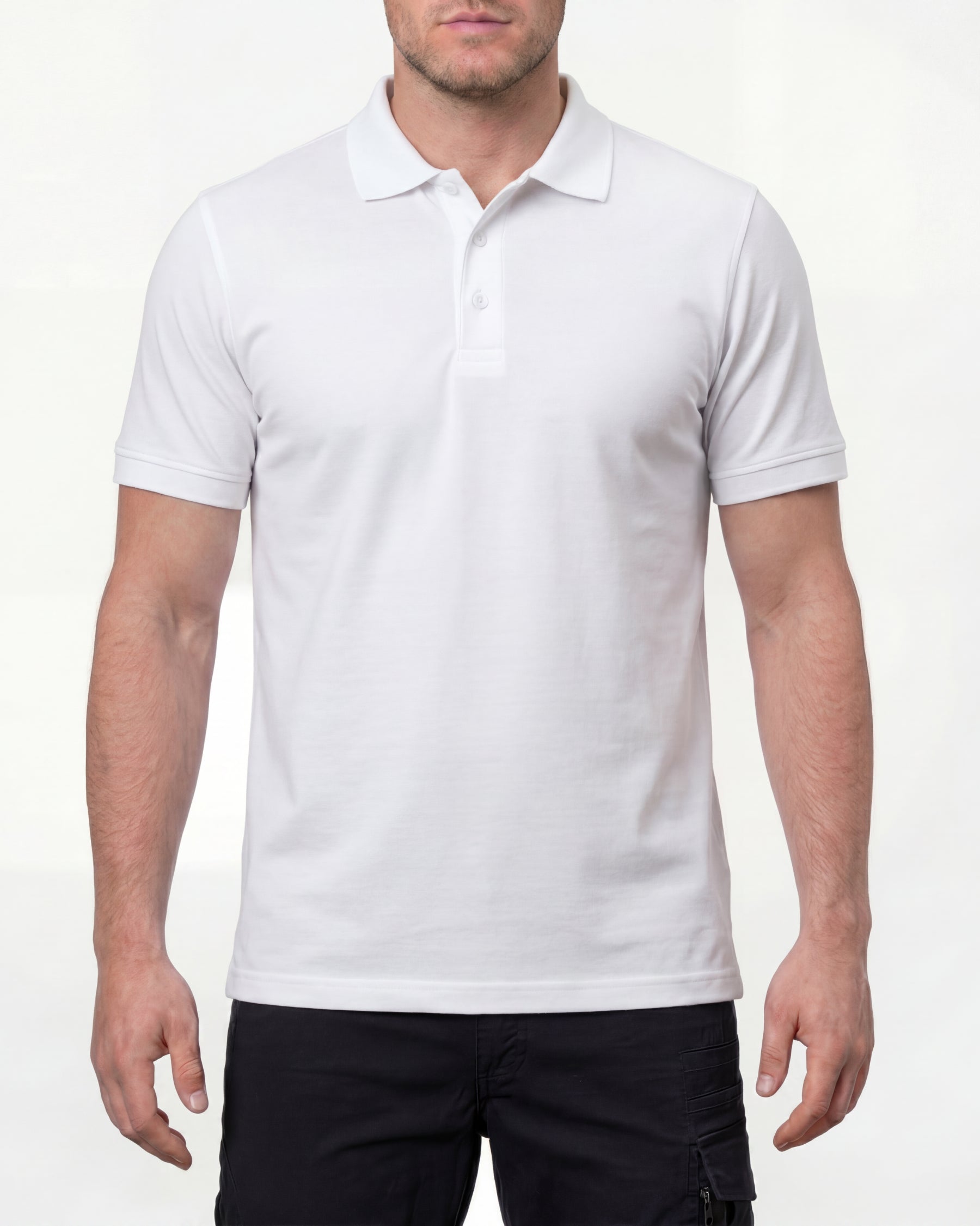 A model wears the STRAUSS Cotton Polo Shirt in white with tan work pants and work boots in a studio product scene