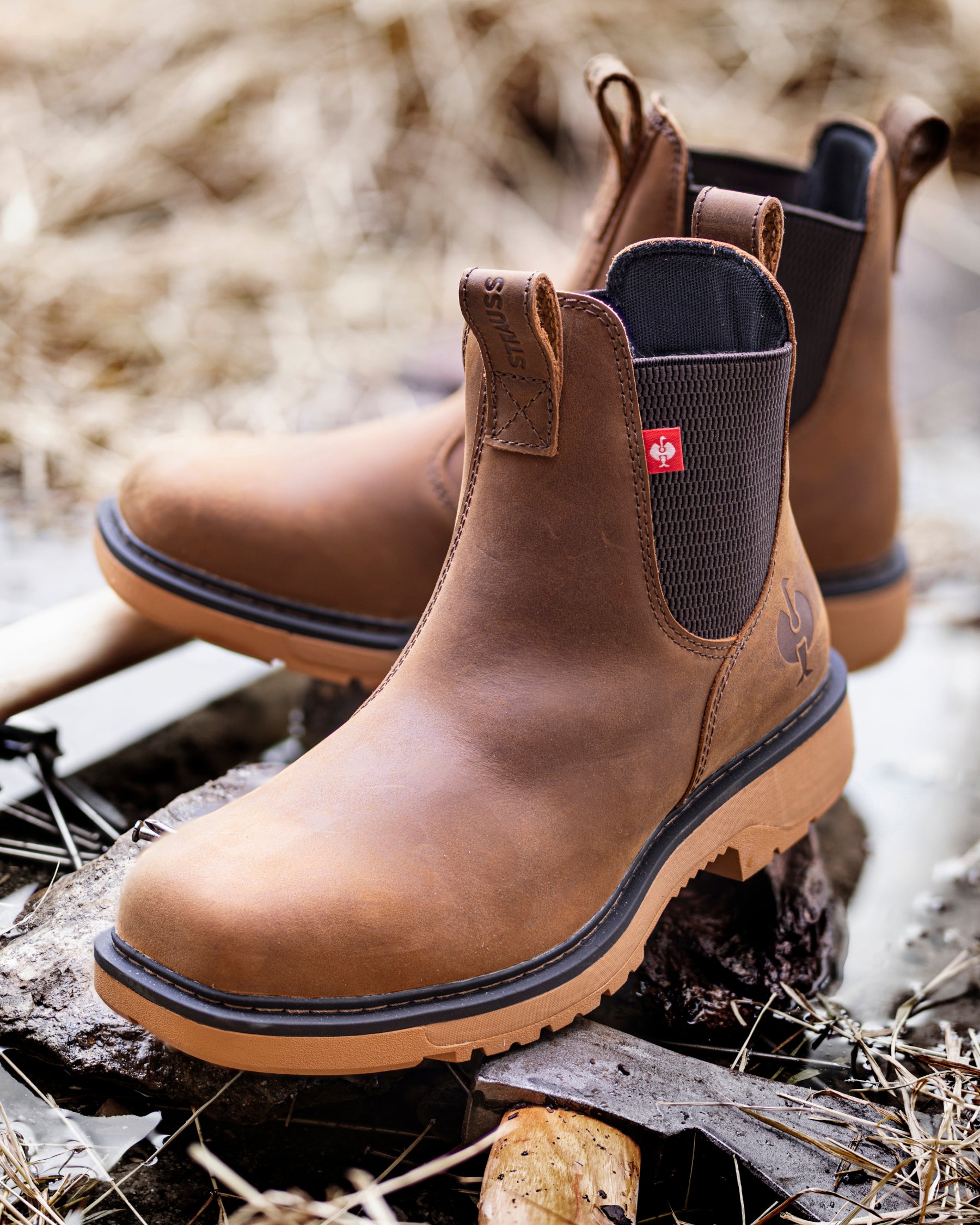STRAUSS Woodford 6-inch Composite Toe Chelsea Boot in Carob brown with workwear in a jobsite scene
