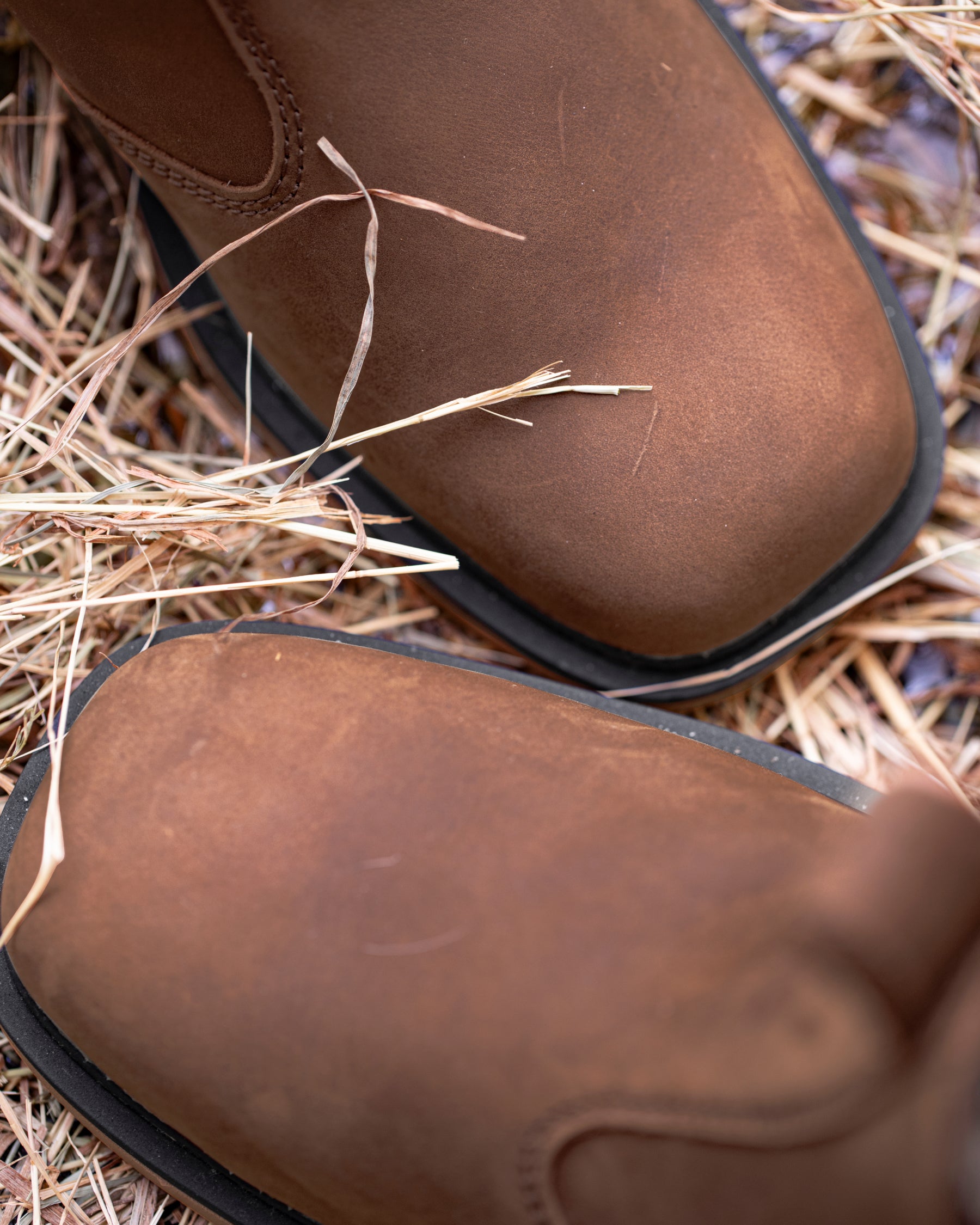 STRAUSS Woodford 6-inch Composite Toe Chelsea Boot in Carob brown shown in use on the job