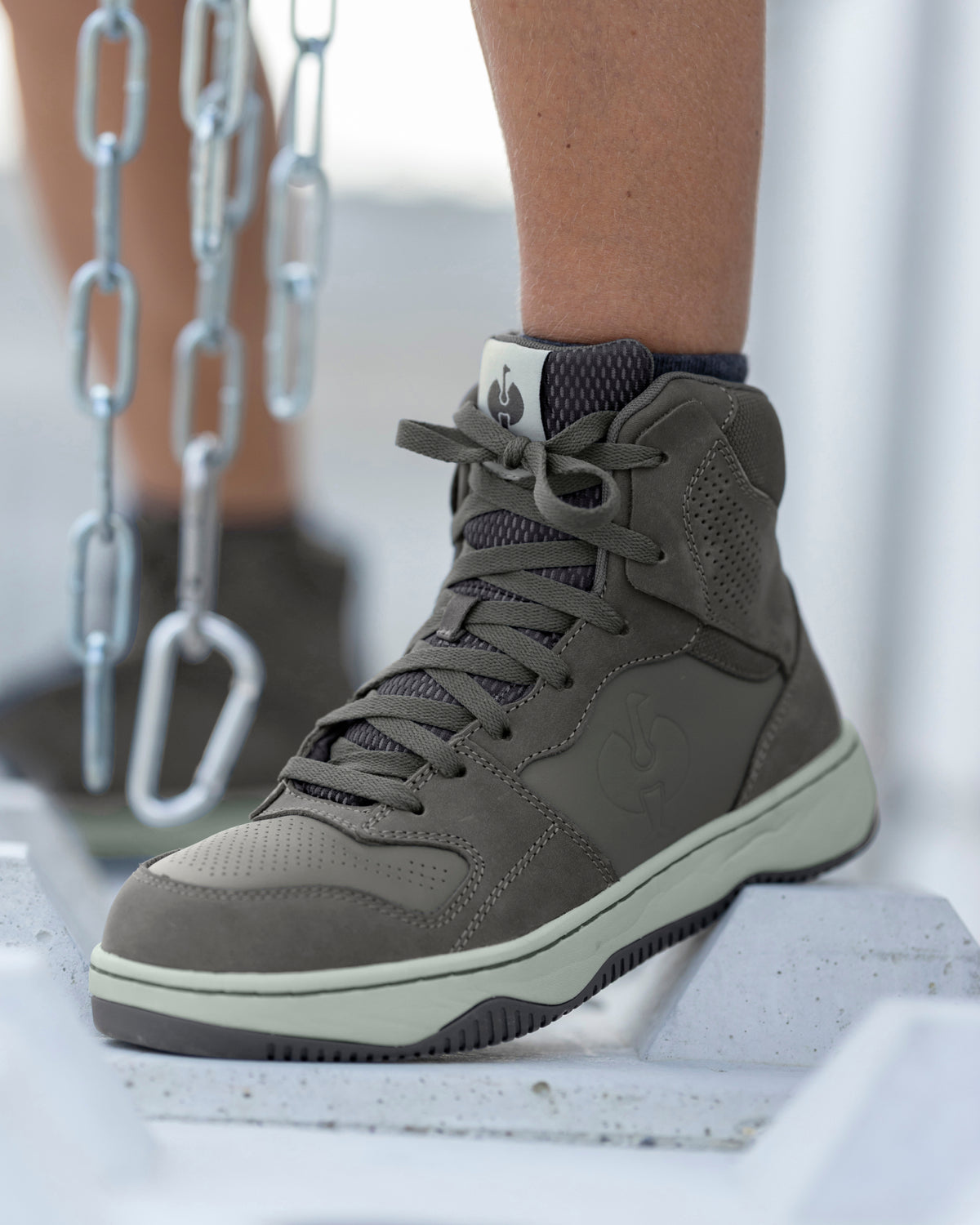 STRAUSS Eindhoven 6-inch Steel Toe Work Boot in Carbon gray shown on rough jobsite ground