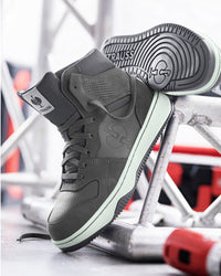 STRAUSS Eindhoven 6-inch Steel Toe Work Boot in Carbon gray shown in use on the job