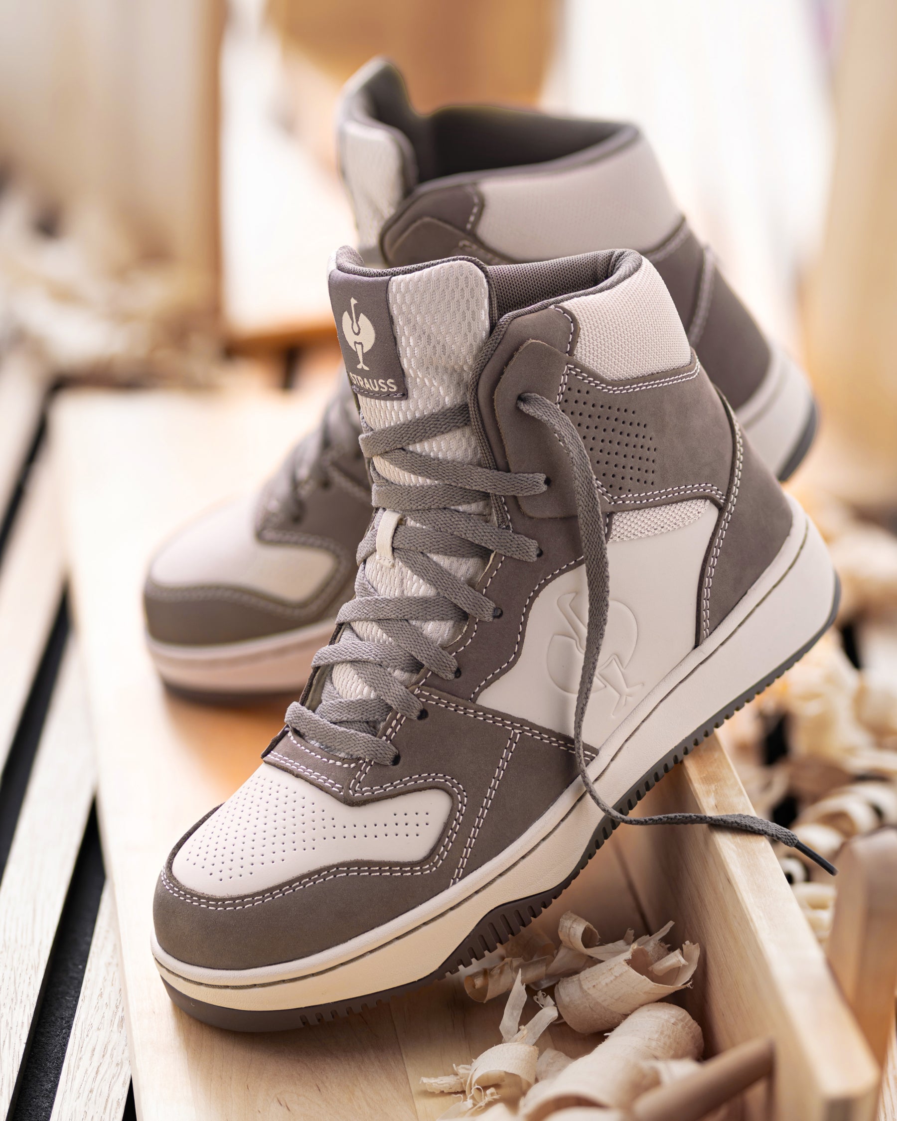 STRAUSS Eindhoven 6-inch Steel Toe Work Boot in Stone gray and Cream shown in use on the job