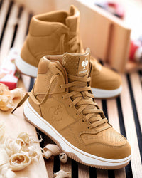 STRAUSS Eindhoven 6-inch Steel Toe Work Boot in Almond brown worn in an outdoor work setting