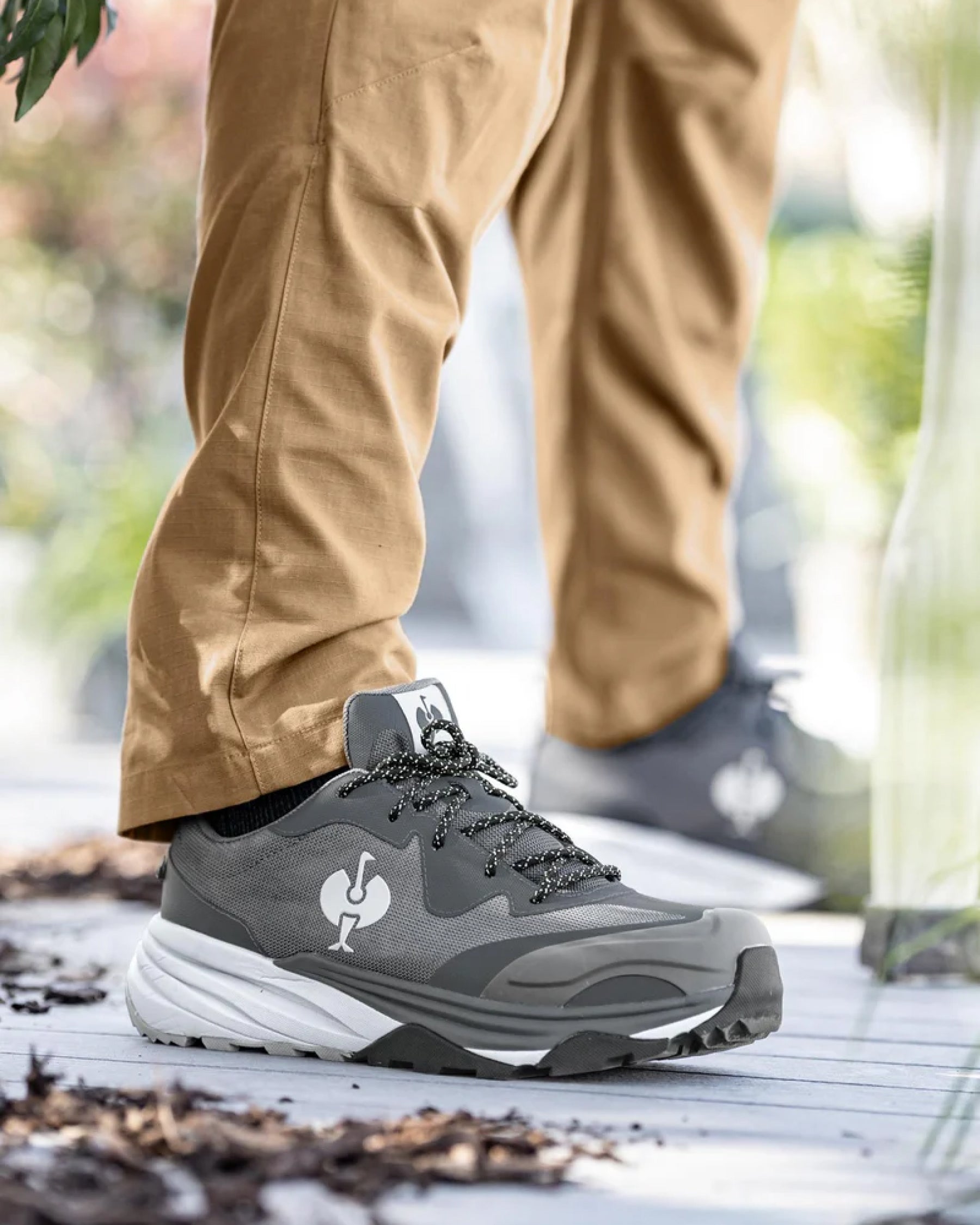 STRAUSS Harlem Composite Toe Work Shoe in Basalt gray shown on rough jobsite ground