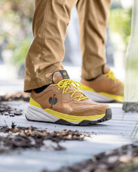 STRAUSS Harlem Composite Toe Work Shoe in Almond brown shown on rough jobsite ground