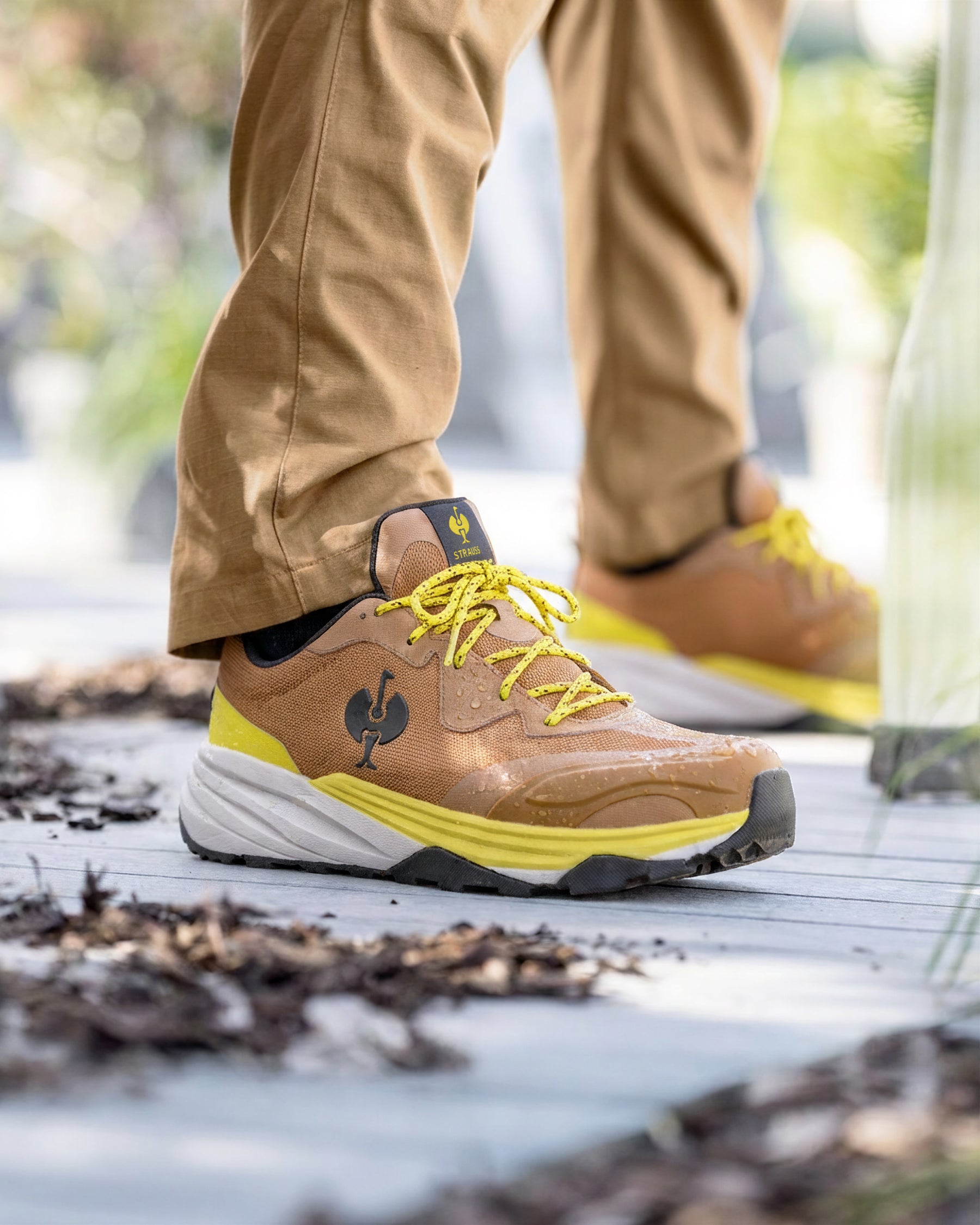 STRAUSS Harlem Composite Toe Work Shoe in Almond brown shown on rough jobsite ground