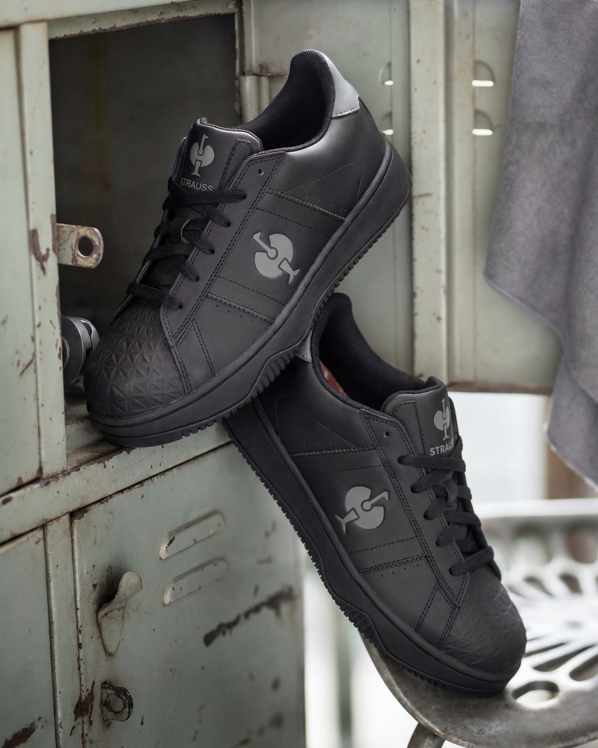 STRAUSS Philly Steel Toe Work Shoe in Black shown in use on the job