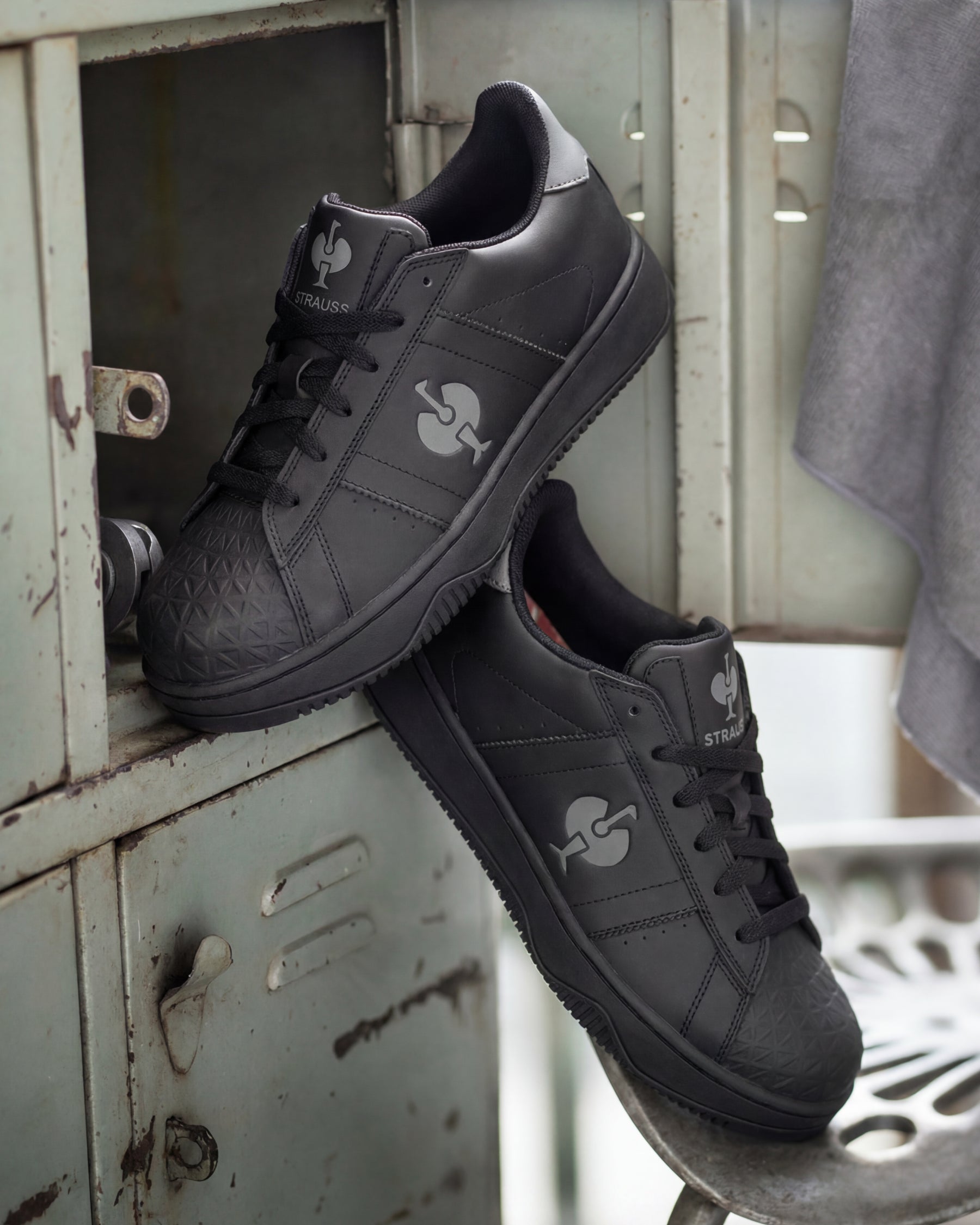 STRAUSS Philly Steel Toe Work Shoe in Black shown in use on the job