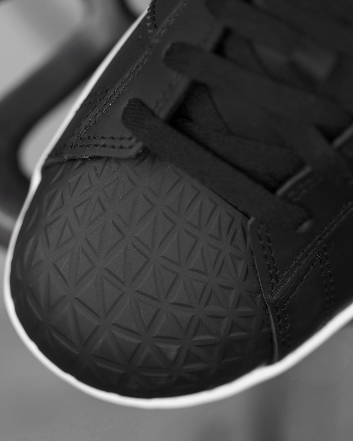 Close-up of the Black and White Philly Steel Toe Work Shoe steel toe area