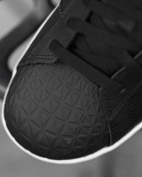 Close-up of the Black and White Philly Steel Toe Work Shoe steel toe area