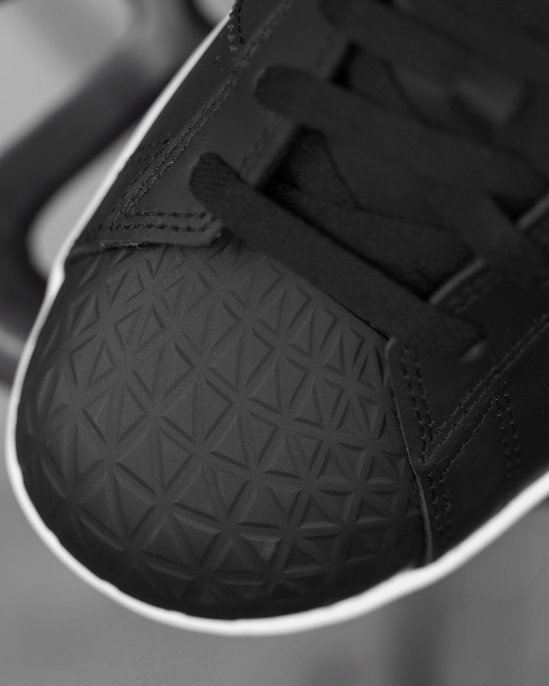 Close-up of the Black and White Philly Steel Toe Work Shoe steel toe area
