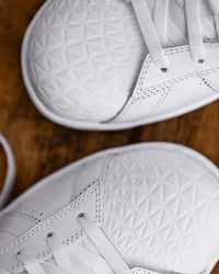 Close-up of the White and Black Philly Steel Toe Work Shoe steel toe area