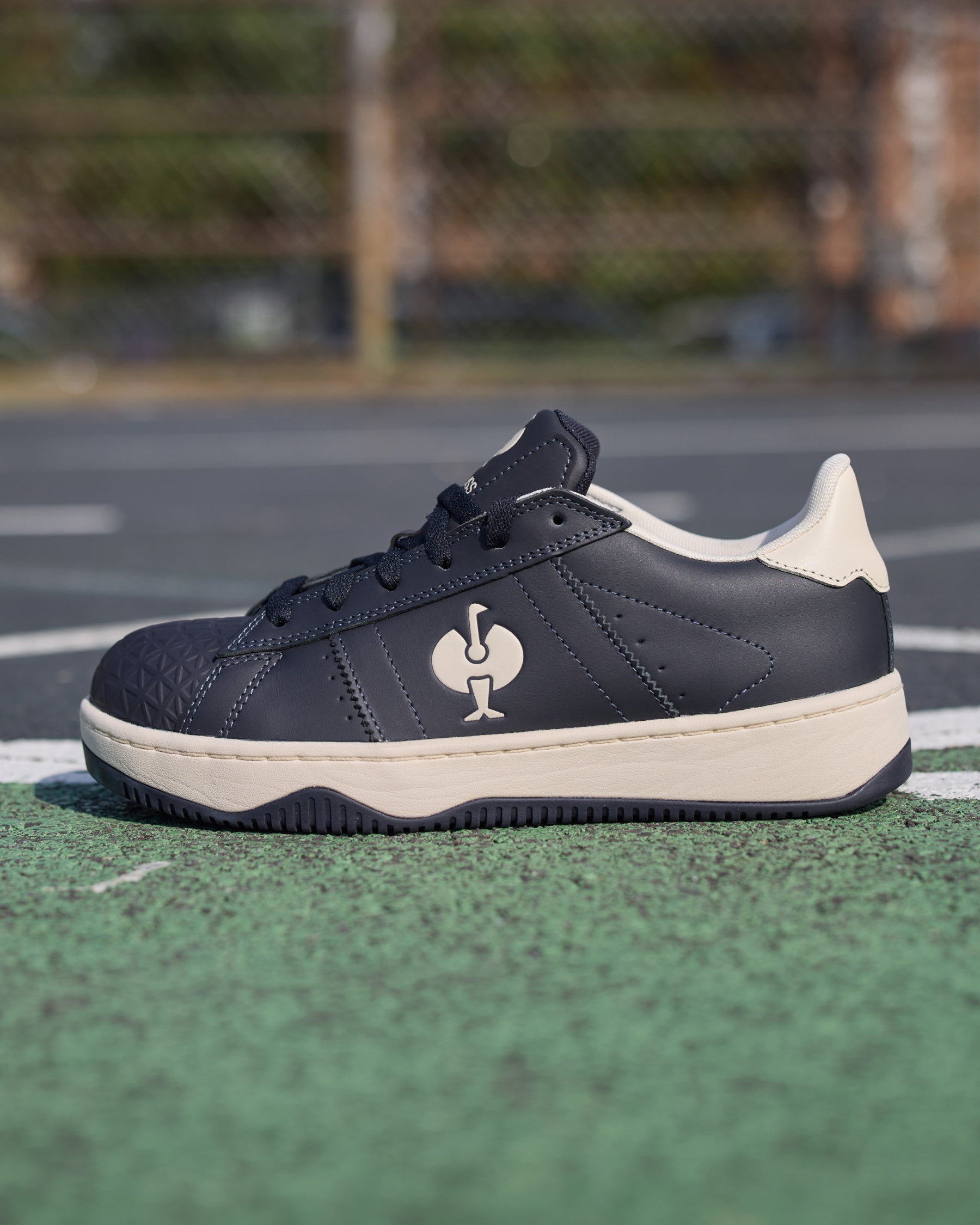 STRAUSS Philly Steel Toe Work Shoe in Nero blue worn in an outdoor work setting