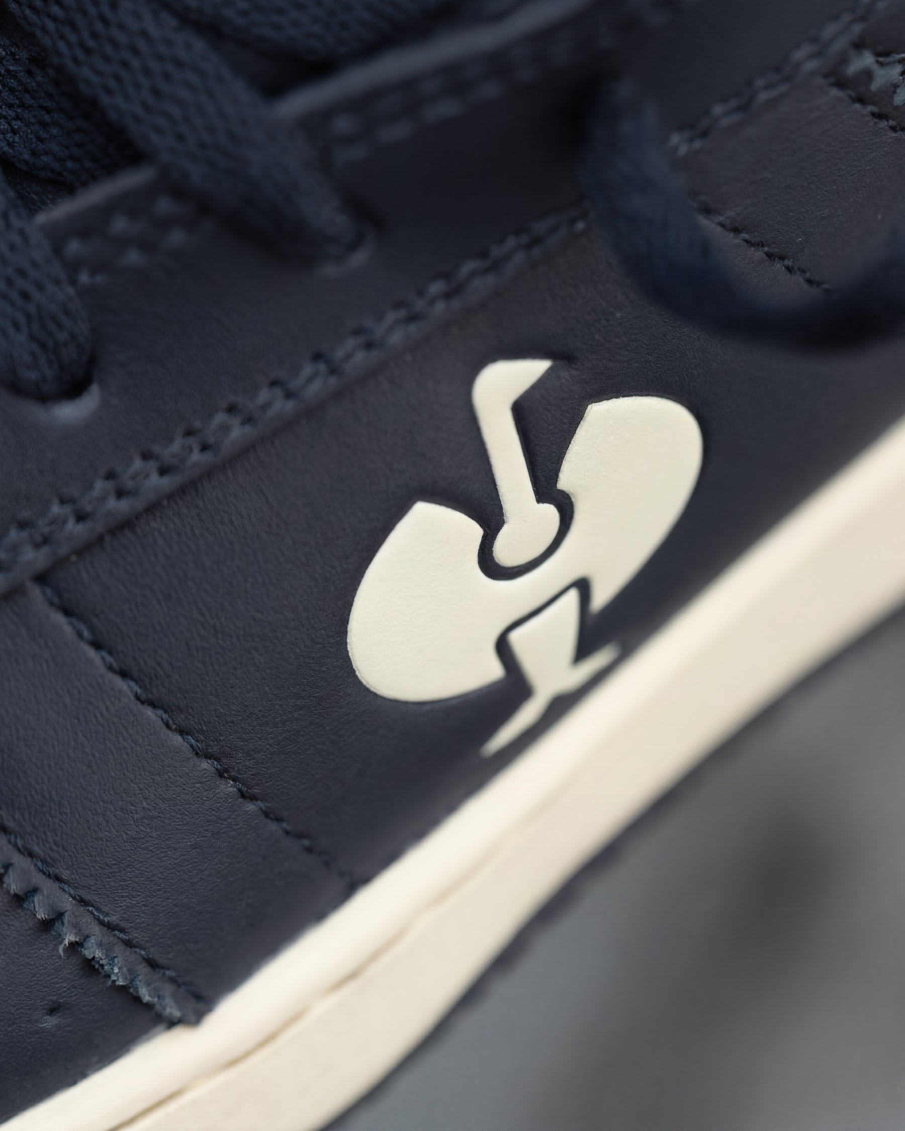 Close-up of the Philly Steel Toe Work Shoe STRAUSS logo