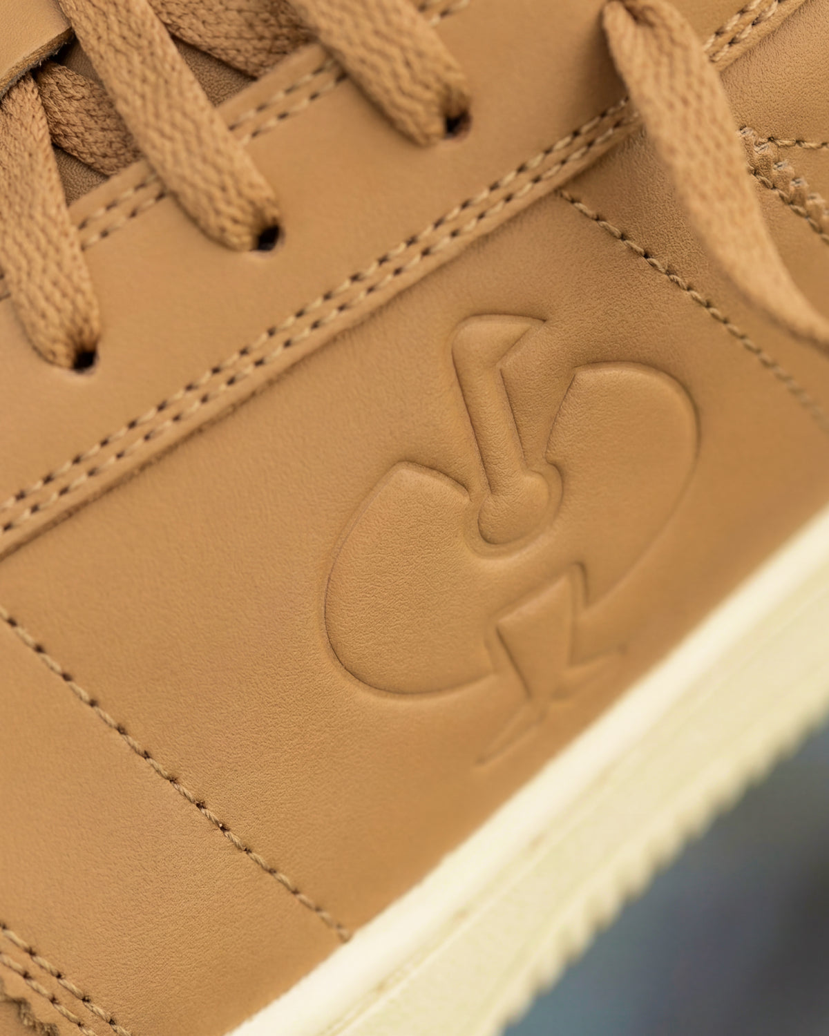 Close-up of the Philly Steel Toe Work Shoe STRAUSS logo