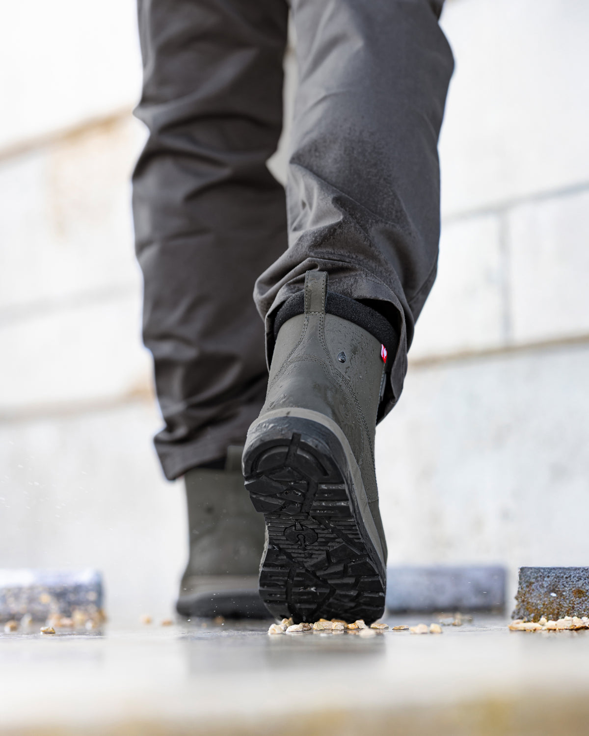 STRAUSS Woodside 6-inch Steel Toe Work Boot in Carbon gray worn in an outdoor work setting
