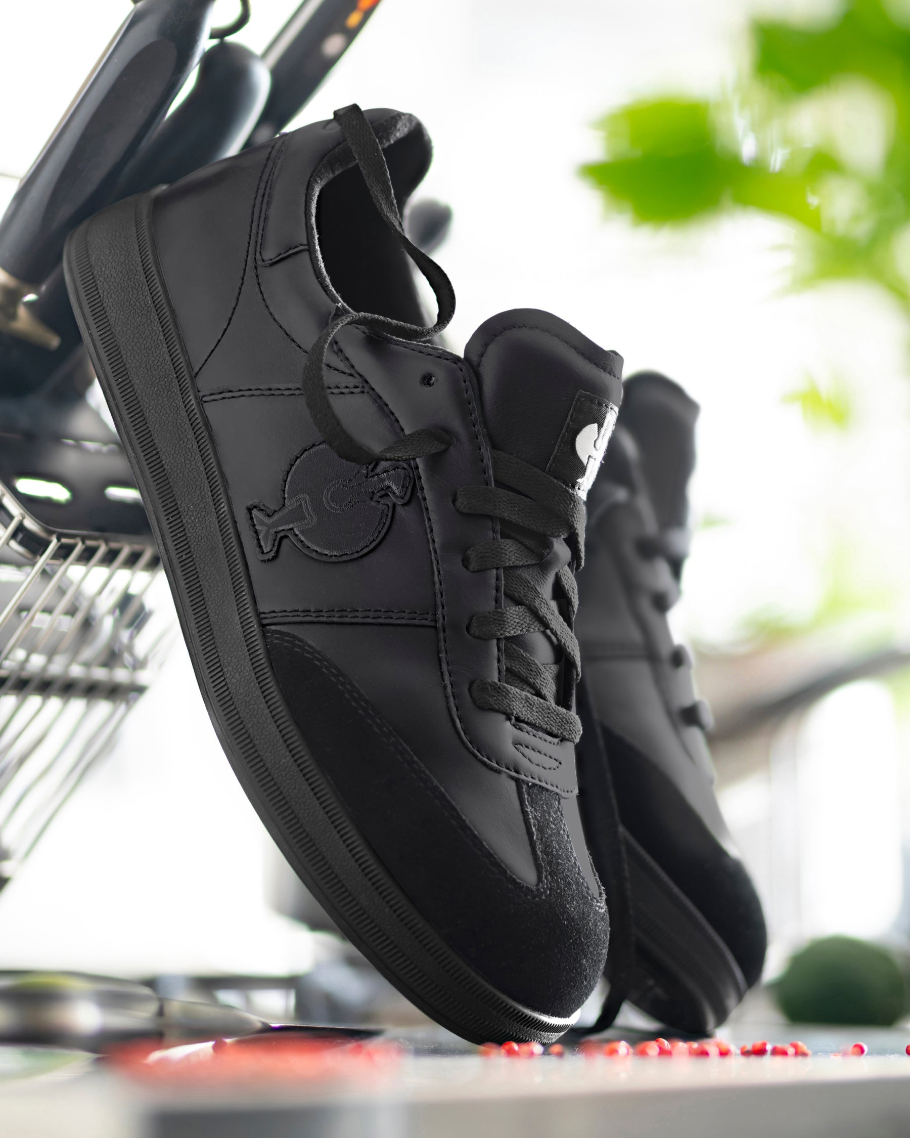 STRAUSS Brooklyn Steel Toe Work Shoe in Black with workwear in a jobsite scene