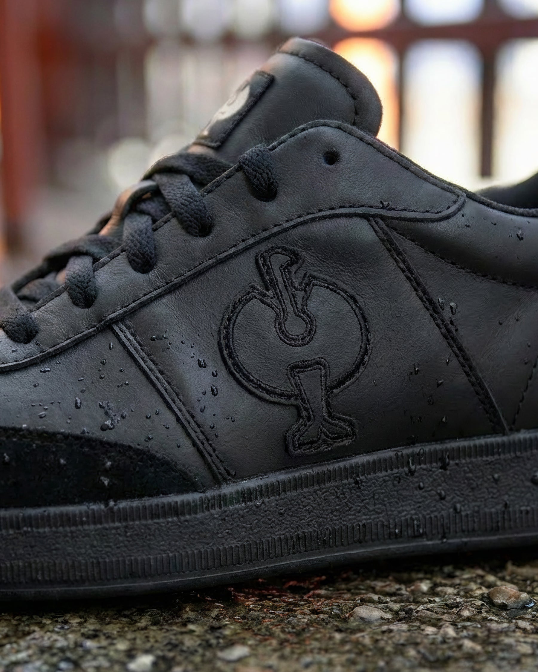 Close-up of the Brooklyn Steel Toe Work Shoe STRAUSS logo