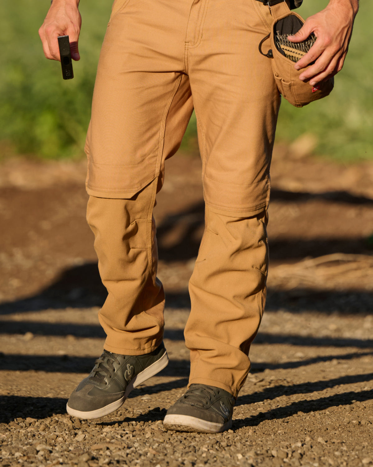 STRAUSS Brooklyn Steel Toe Work Shoe in Carbon gray worn in an outdoor work setting