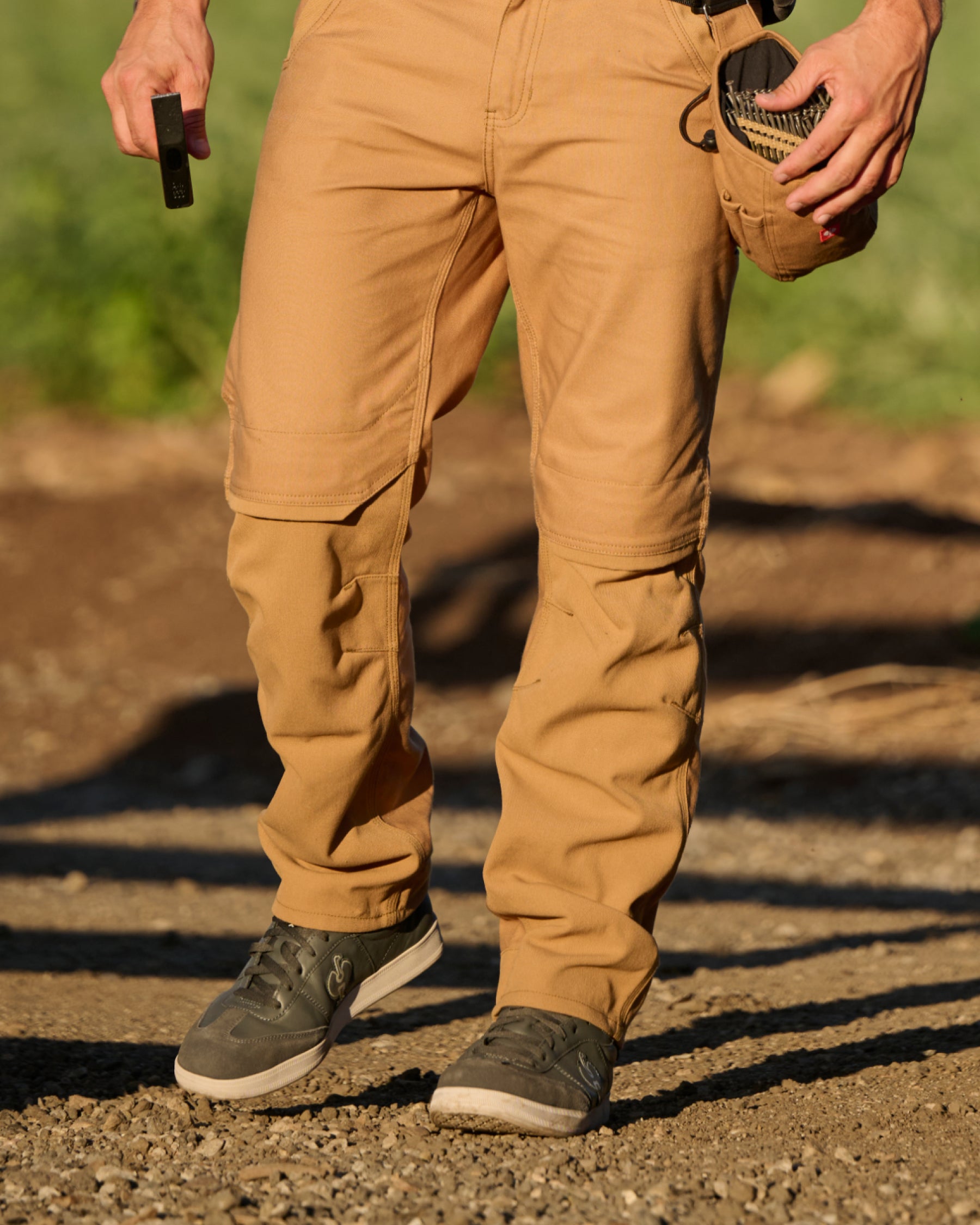 STRAUSS Brooklyn Steel Toe Work Shoe in Carbon gray worn in an outdoor work setting