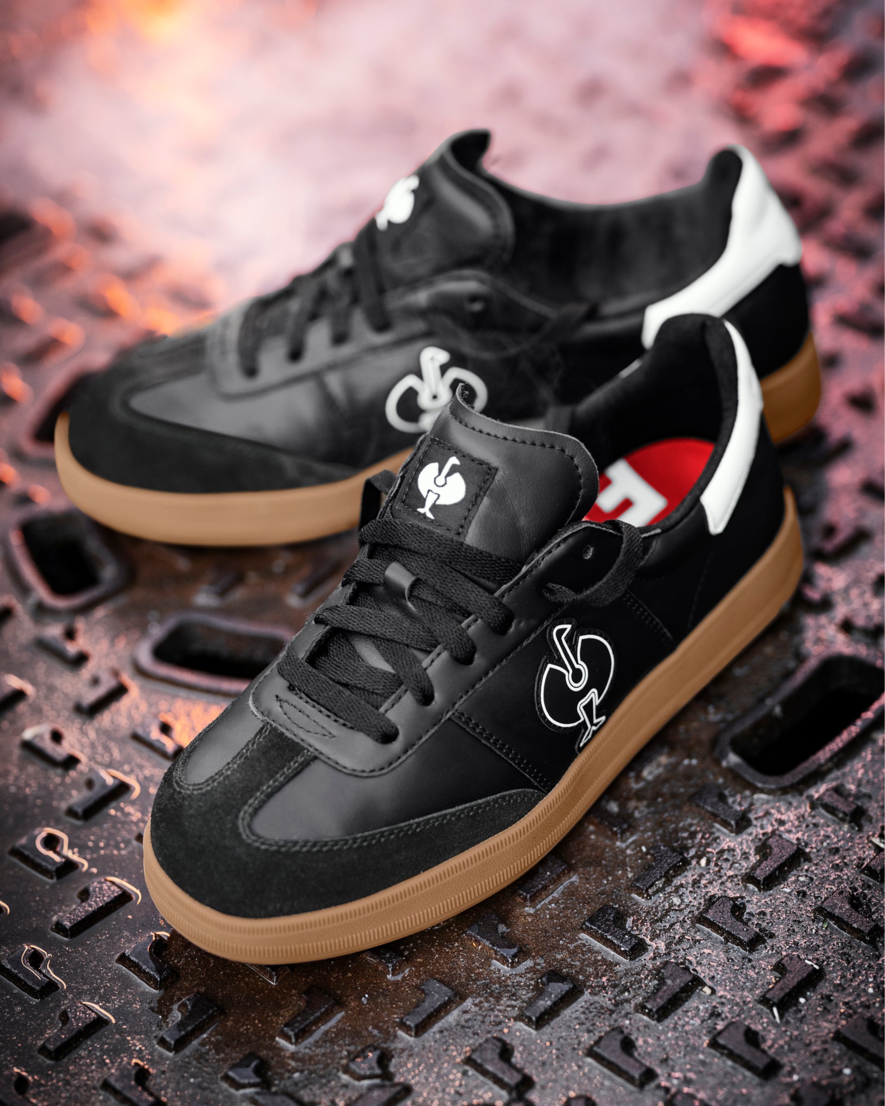 STRAUSS Brooklyn Steel Toe Work Shoe in Black and White with workwear in a jobsite scene