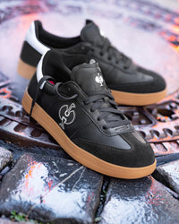 STRAUSS Brooklyn Steel Toe Work Shoe in Black and White shown in use on the job