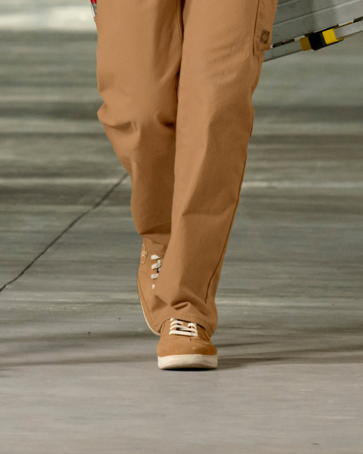 STRAUSS Brooklyn Steel Toe Work Shoe in Almond brown shown on rough jobsite ground