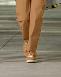 STRAUSS Brooklyn Steel Toe Work Shoe in Almond brown shown on rough jobsite ground