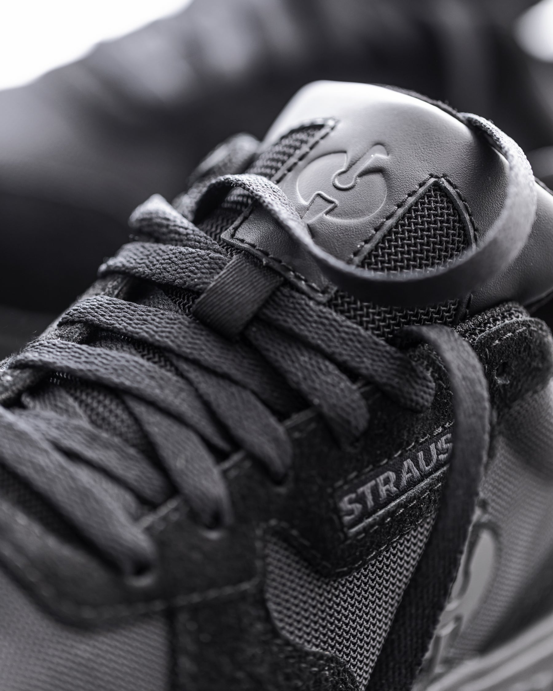 Close-up of the Black Canberra Steel Toe Work Shoe upper and laces